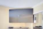 65 inch Smart TV in the third bedroom